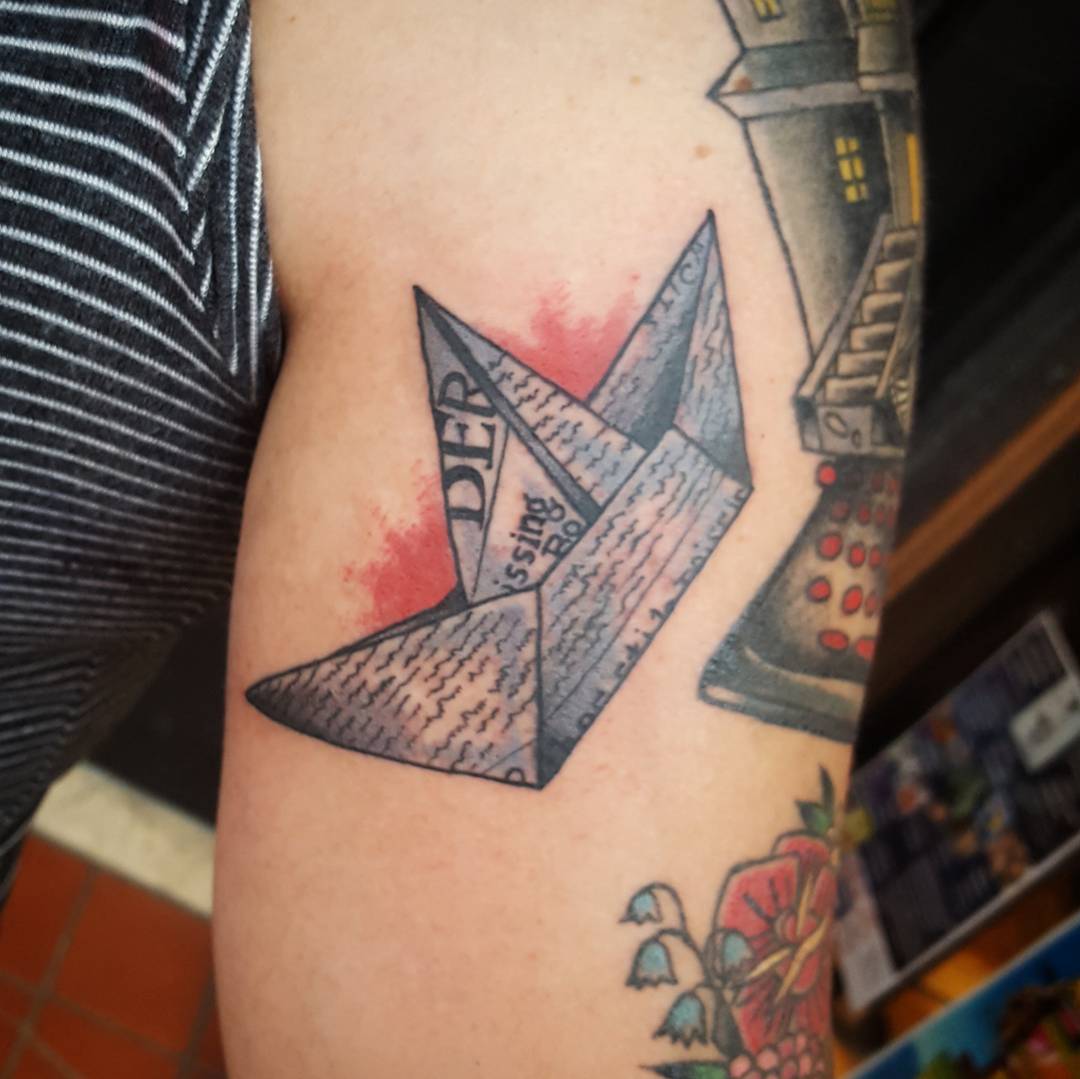 This is the newspaper boat from the movie "It". I tried including headlines from the movie and the town in which it took place, Derry. This is part of Sarah's Stephen King sleeve that I've been working on. #it #stephenking